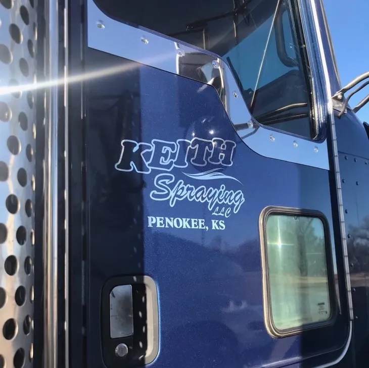 Close-up of truck door signage